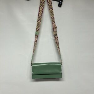 Stylish Green Crossbody Bag with Patterned Strap